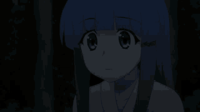 a girl with blue hair is looking at the camera