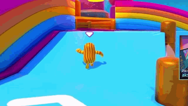 a cartoon character is walking on a colorful inflatable slide .