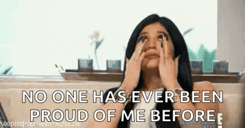 a woman is crying with the words no one has ever been proud of me before on the bottom