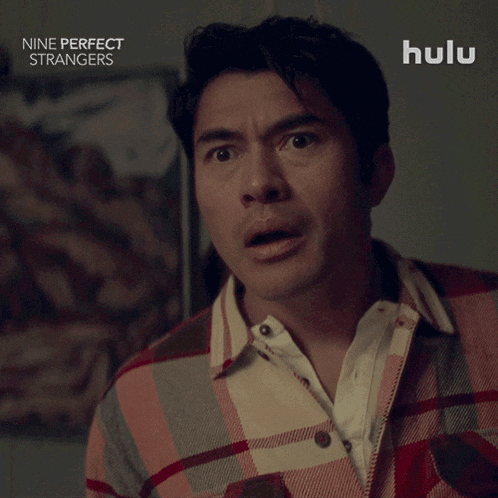 a man with a surprised look on his face is featured in a hulu ad