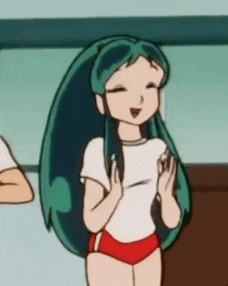 a cartoon girl with long green hair is wearing red shorts and a white shirt and smiling .
