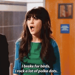 a woman in a green dress is saying i brake for birds and i rock a lot of polka dots