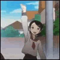 a girl in a school uniform is raising her hand in the air in front of a building .