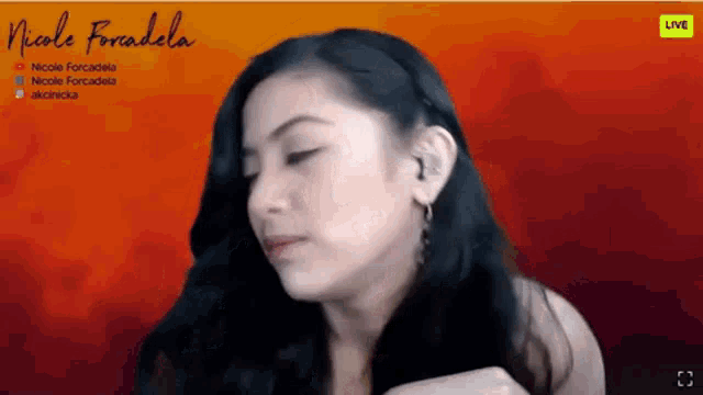 a close up of a woman 's face with her eyes closed