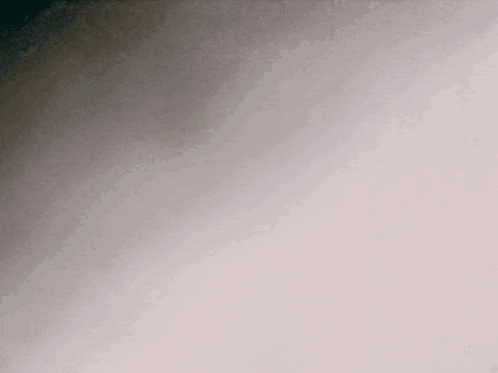 a close up of a white background with a gray gradient