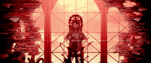 a girl is sitting in a chair in front of a large window