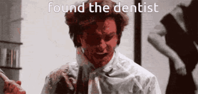 a man in a white shirt and tie is holding a bloody knife and the words found the dentist are above him