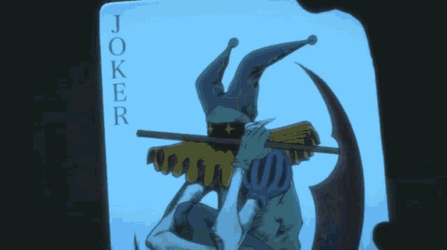 a person is holding a joker playing card