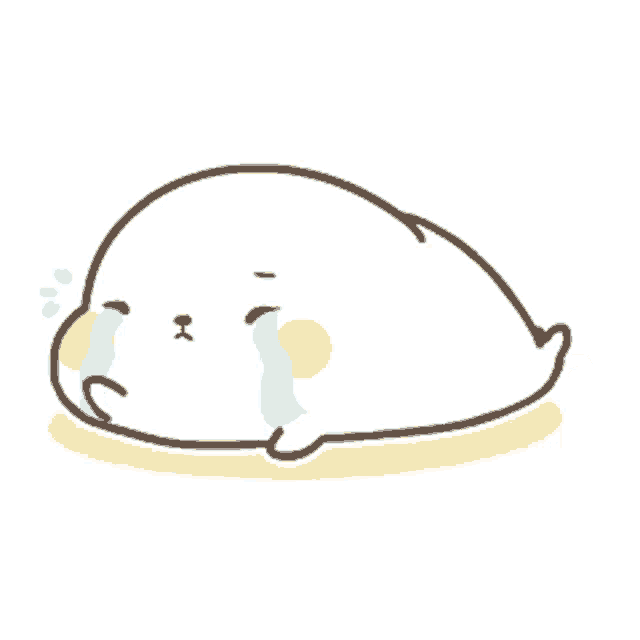 a cartoon seal is laying down and crying with tears running down its face .