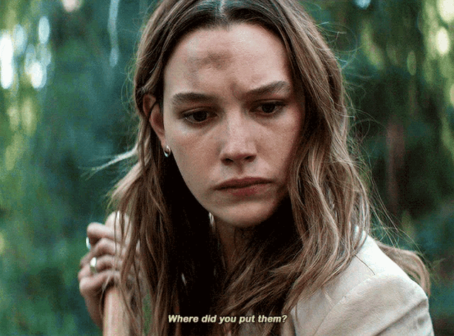 a close up of a woman 's face with the words " where did you put them "