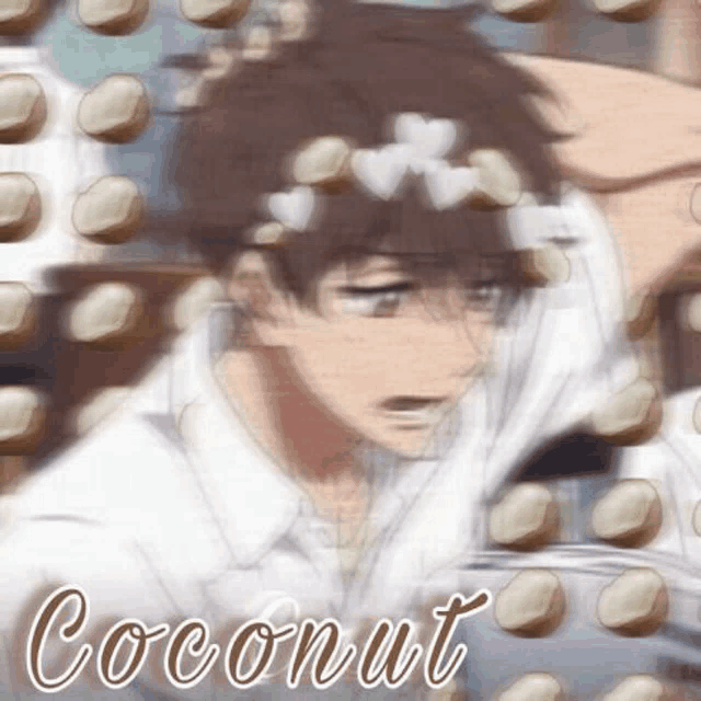 a blurry picture of a boy with coconuts on his head and the word coconut on the bottom .