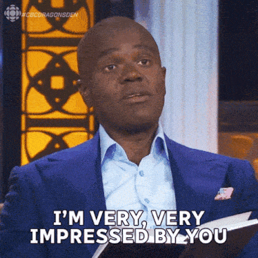 a man in a blue suit is saying i 'm very very impressed by you