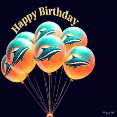 a bunch of dolphin balloons with the words happy birthday