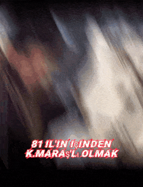 a blurred image with the words 81 il ' in inden k.marasli olmak in red