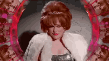a woman with red hair and a white fur coat