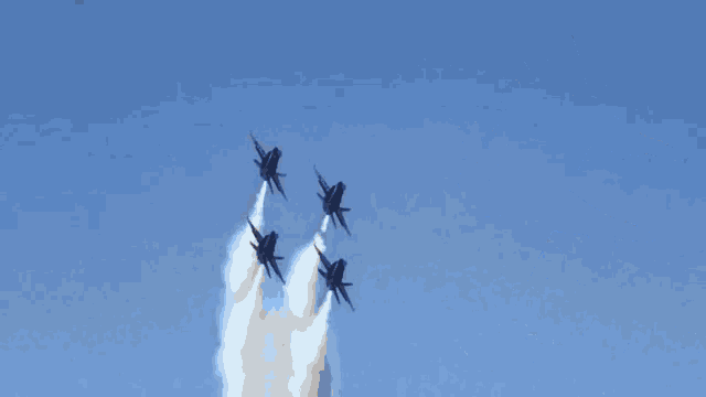 four us navy fighter jets fly in formation