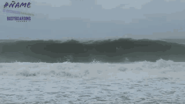 a poster for bodyboarding panama shows a large wave coming in