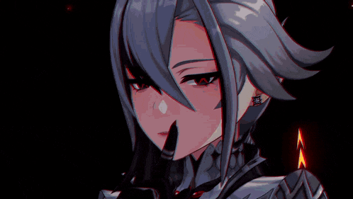a girl with long hair and red eyes is standing in a dark room with red lights behind her .