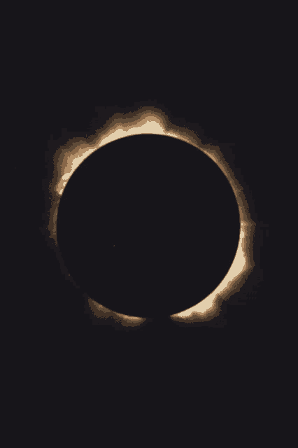 a partial eclipse of the sun with the sun shining brightly