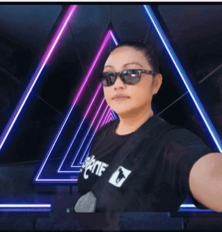 a woman wearing sunglasses and a shirt that says supreme