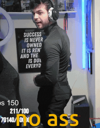 a man wearing headphones standing in front of a sign that says success is never owned