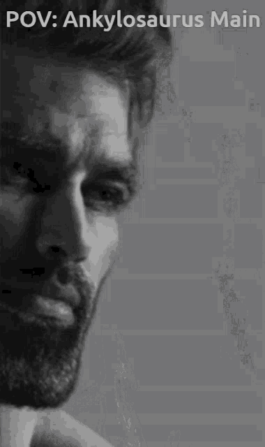 a man with a beard is shown in a black and white photo with the caption pov : ankylosaurus main