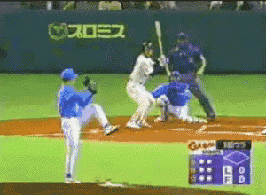 a baseball game is being played in a foreign language with a scoreboard displaying the score