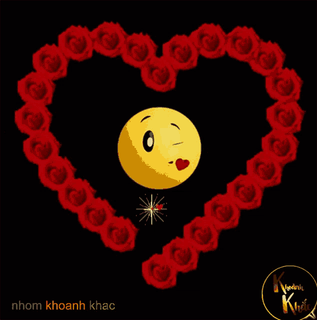 a heart made of red roses with a yellow smiley face in the center
