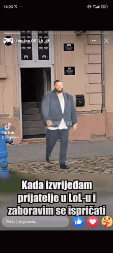 a man in a suit is standing in front of a building with a fire hydrant in the background