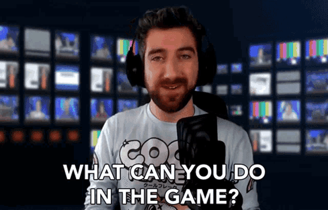 a man wearing headphones and a shirt that says coo what can you do in the game