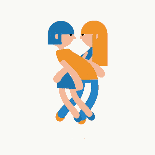 a man is carrying a woman in his arms while they are dancing