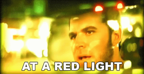 At A Red Light Stopping GIF - At A Red Light Stopping Stop Light GIFs