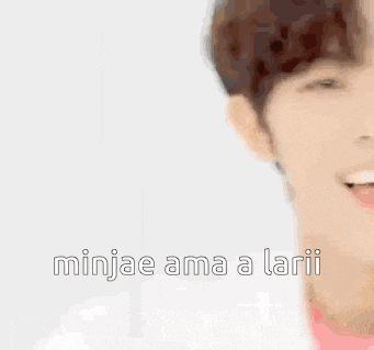 a close up of a person 's face with the words `` minjae ama a larii '' written in the corner .