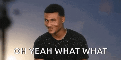 a man in a black shirt is making a funny face and saying `` oh yeah what what '' .