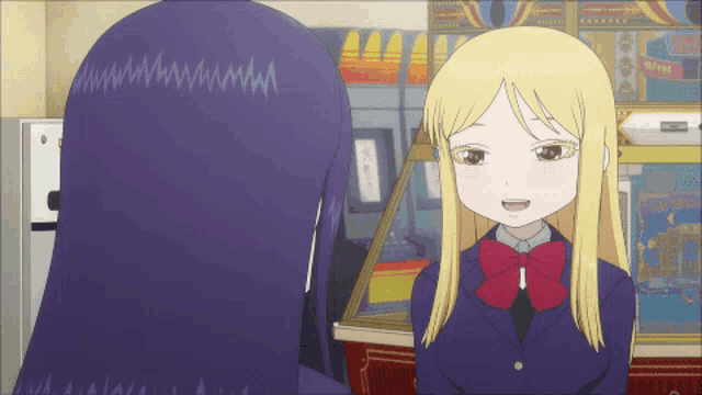 a girl with blonde hair and a red bow tie stands next to a man