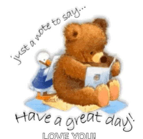 a teddy bear is sitting on a blanket reading a book