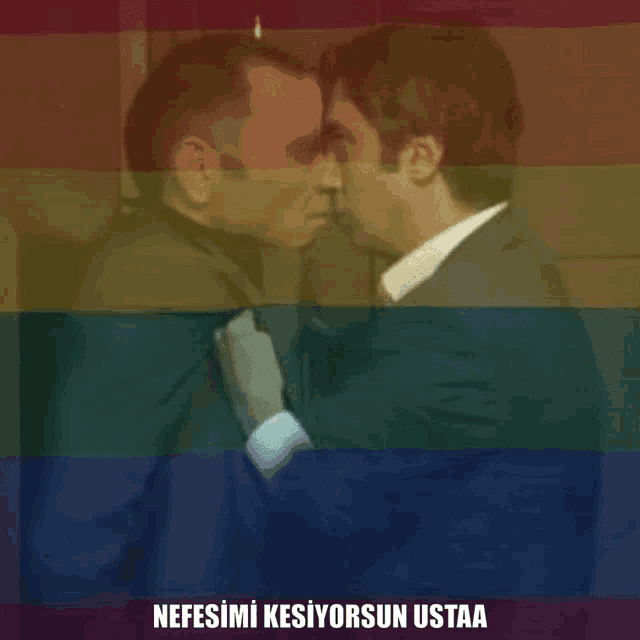 two men kissing with the words nefesimi kesiyorsun ustaa written below them