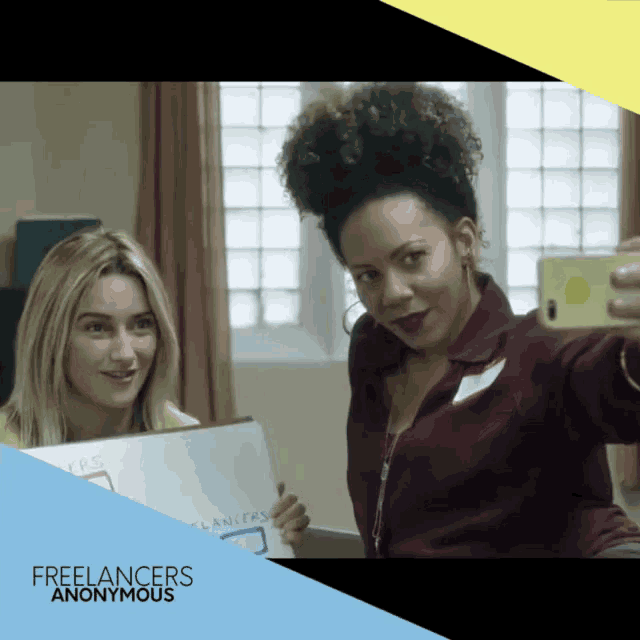 two women are taking a selfie with the words freelancers anonymous behind them