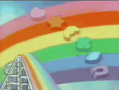 a roller coaster going over a rainbow with a few letters on the ground