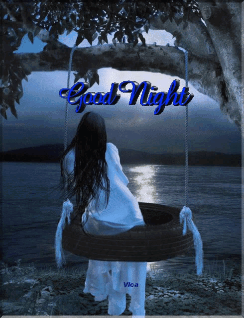 a picture of a woman sitting on a tire swing with the words good night on the bottom