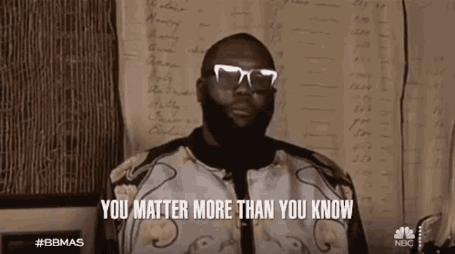 a man wearing sunglasses and a floral jacket says you matter more than you know