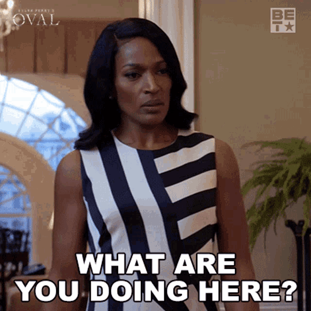 a woman in a black and white striped dress is asking what are you doing here