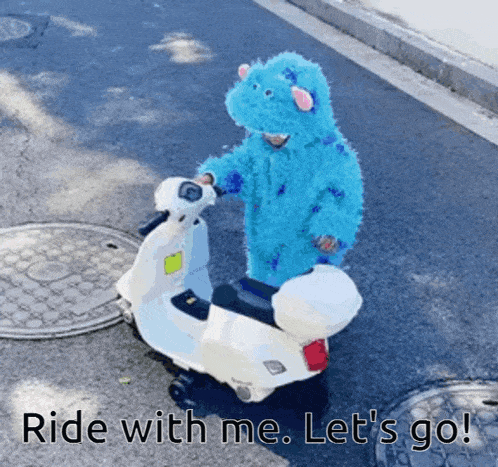 a child in a monsters inc costume is riding a toy scooter with the caption ride with me let 's go
