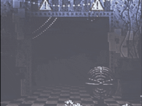 a dark room with a fan and a warning sign on the wall