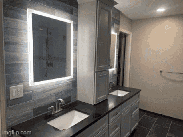 a bathroom with two sinks and two mirrors with imgflip.com at the bottom