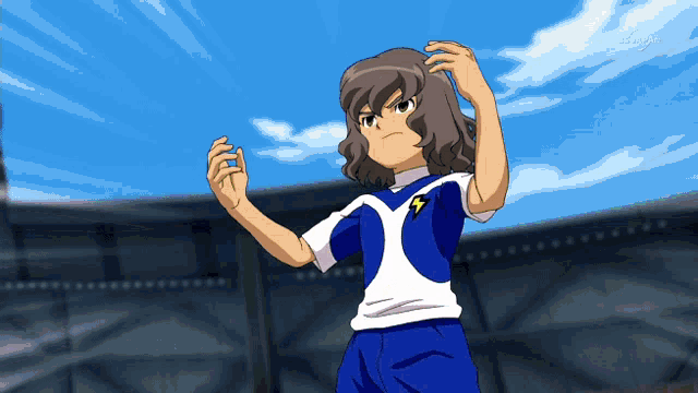 a boy in a blue and white shirt with a lightning bolt on it