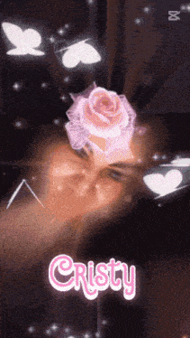 the name cristy is on a screen with a rose