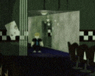 a blurred image of a person standing in a dark room with a table and chairs .