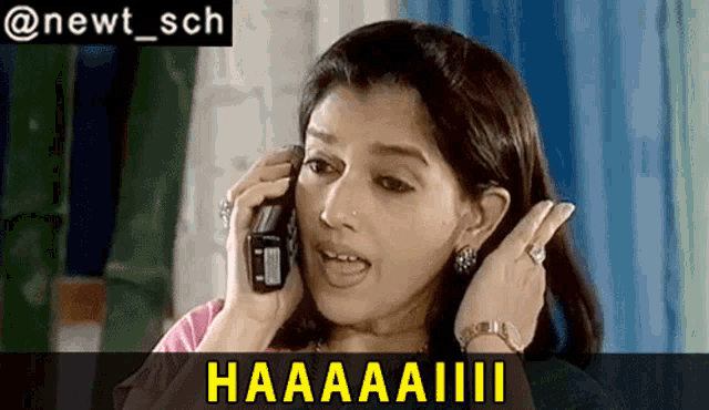 a woman is talking on a cell phone and the caption says haaaaiii