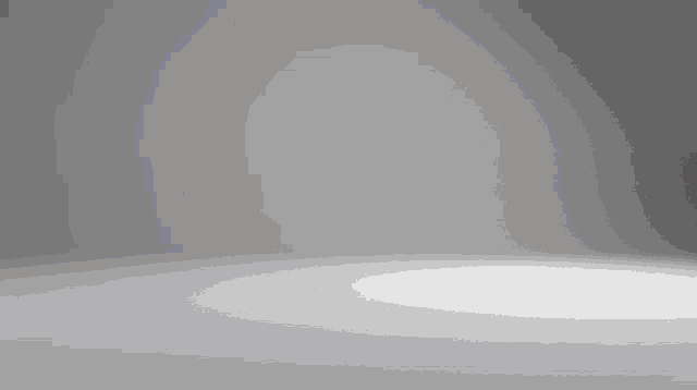 a robot with a blue and white stripe on it 's helmet